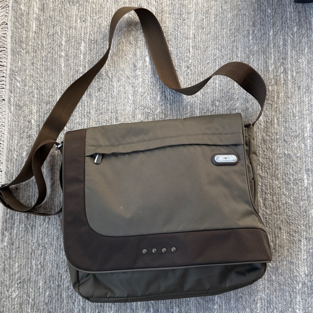 TUMI Tech Messenger Cross Body Bag.
Olive color
